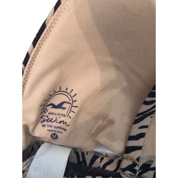 Animal print Hollister animal print bikini top. Tan base with black stripes size - Picture 4 of 5